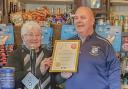Pembrokeshire CAMRA chair, Alwen Thomas, presents landlord Steve Adams with his Pub of the Year certificate