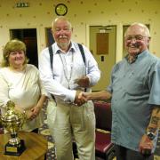 CHEQUE IT OUT:  Linda Hawkins-Davies, Ron Southwell (being presented with the proceeds) and Emrys Stephens.
