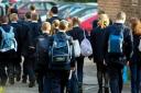 Pupils who use school buses to attend school outside of their catchment area will have to pay £2 a day. 