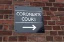 A coroner's court sign