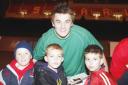 Jonathan Davies poses with young Scarlets fans