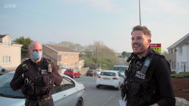 Milford Mercury: Sam laughing after finally tracing the abandoned 999 call. Picture: BBC