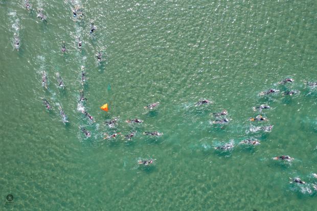 Milford Mercury: The swim as part of the triathlon. Picture: Behind the Lens Media