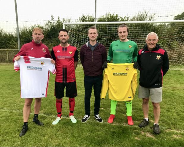 Milford Mercury: Clarbeston Road AFC Senior Team managers Matthew Ellis and Matthew Fox with the new shirts together with Broadway Partners Wales manager Reece Simmons, goalkeeper Sam Edge and club chairman, Steve Brown