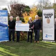 Stuart and Liz Beresford with Steve and Lynne Vincent Davies presenting a cheque for £5000 to Judith Griffiths of Pembrokeshire Friends of Prostate Cymru accompanied by fellow members Simon Moffett, John Williams and Brian Harries