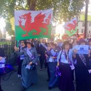 1950s born women protesting in Cardiff.