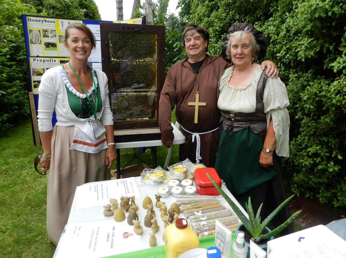 Caroline White - Forever Living Aloe Vera products, and Mel and Jackie Mends who were there with their bees and honey products, at Llandstadwell Medieval Fayre, Saturday June 20, 2015. 
PICTURE: Western Telegraph/Milford Mercury