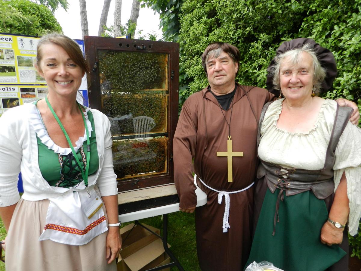 Caroline White - Forever Living Aloe Vera products, and Mel and Jackie Mends who were there with their bees and honey products, at Llandstadwell Medieval Fayre, Saturday June 20, 2015. 
PICTURE: Western Telegraph/Milford Mercury