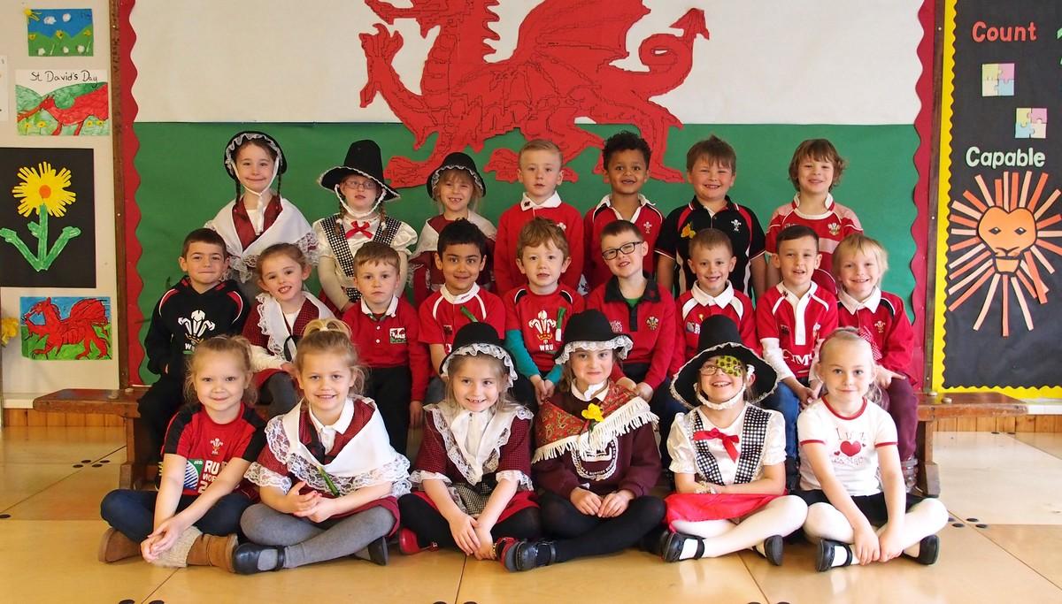 Hubberston VC School children proudly show off the Welsh flag for St David's Day.